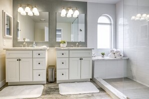 Combined shower/tub, hair dryer, towels, soap