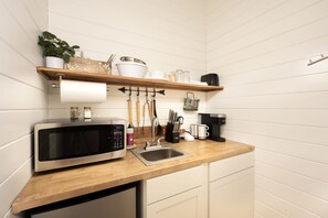 Fridge, microwave, coffee/tea maker, toaster