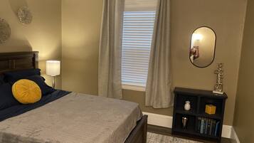 1 bedroom, desk, iron/ironing board, travel cot