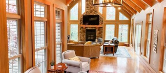 Spacious, family-friendly lodge on 10 wooded acres. Sleeps 20 with 5 bedrooms,  stocked pond