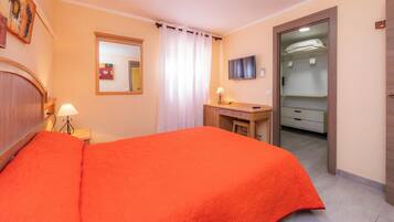 2 dormitorios, tabla de planchar con plancha, wifi gratis y ropa de cama