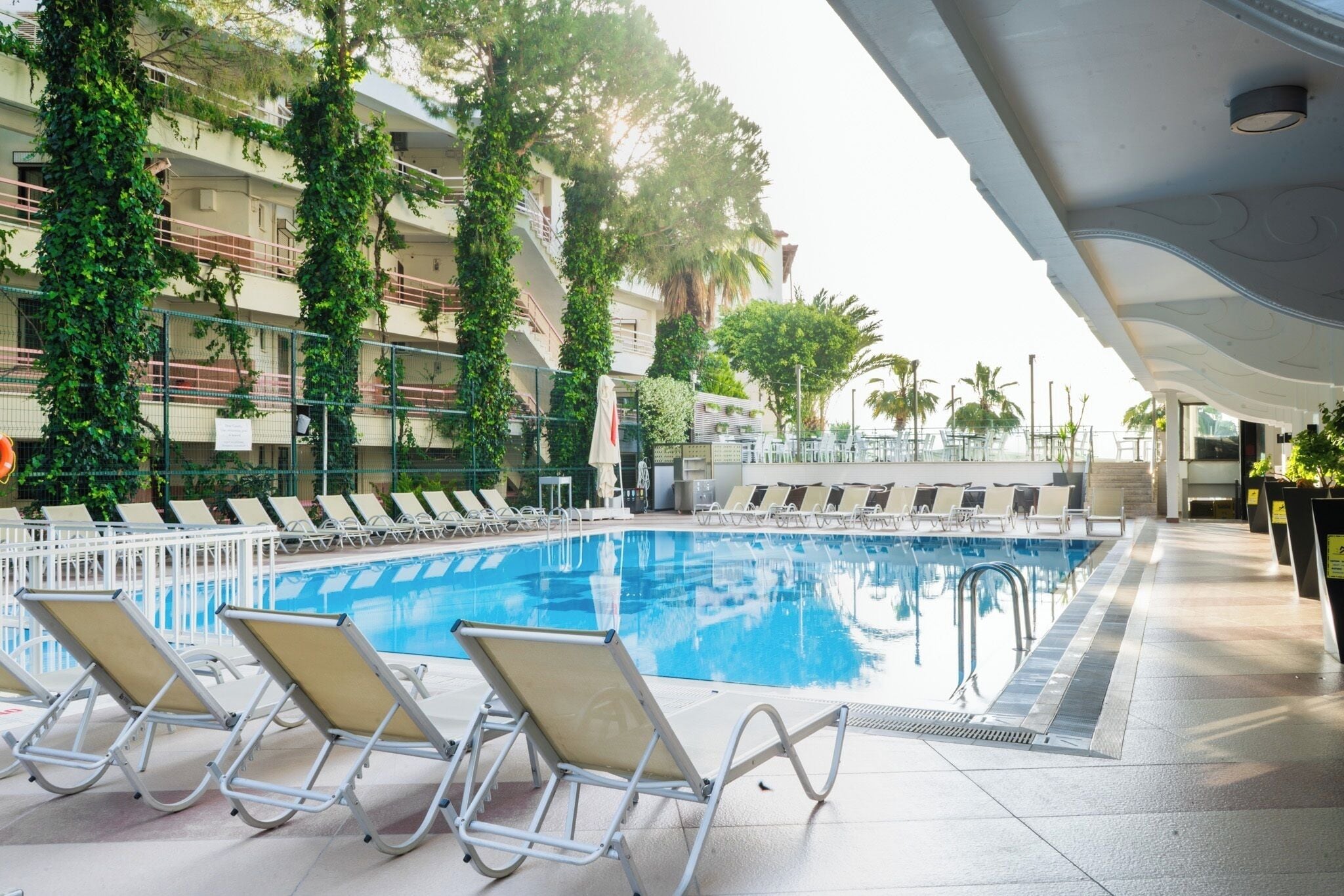 Indoor pool, 2 outdoor pools, open 7:30 AM to 6:30 PM, pool umbrellas