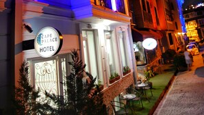 A hotel with a sign reading "Cape Palace Hotel" and a well-lit entrance. - Cape Palace Hotel (Istanbul)