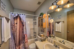 Combined shower/bathtub, hair dryer, towels, soap