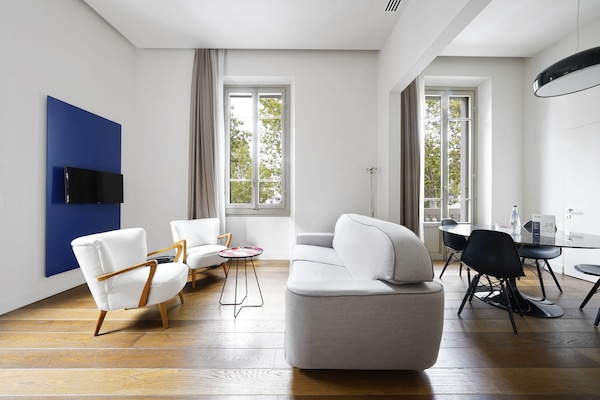 L 1 Bedroom Apartment, Sofa Bed | Living area | 43-inch Smart TV with satellite channels