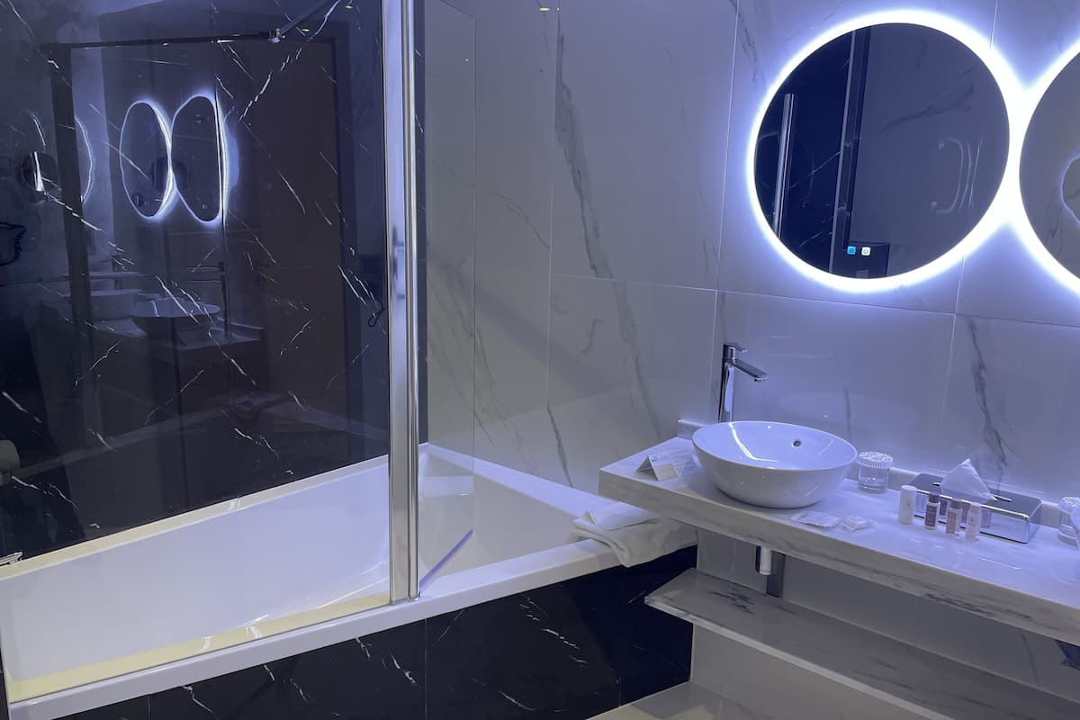 premium double room | bathroom | hair dryer, towels