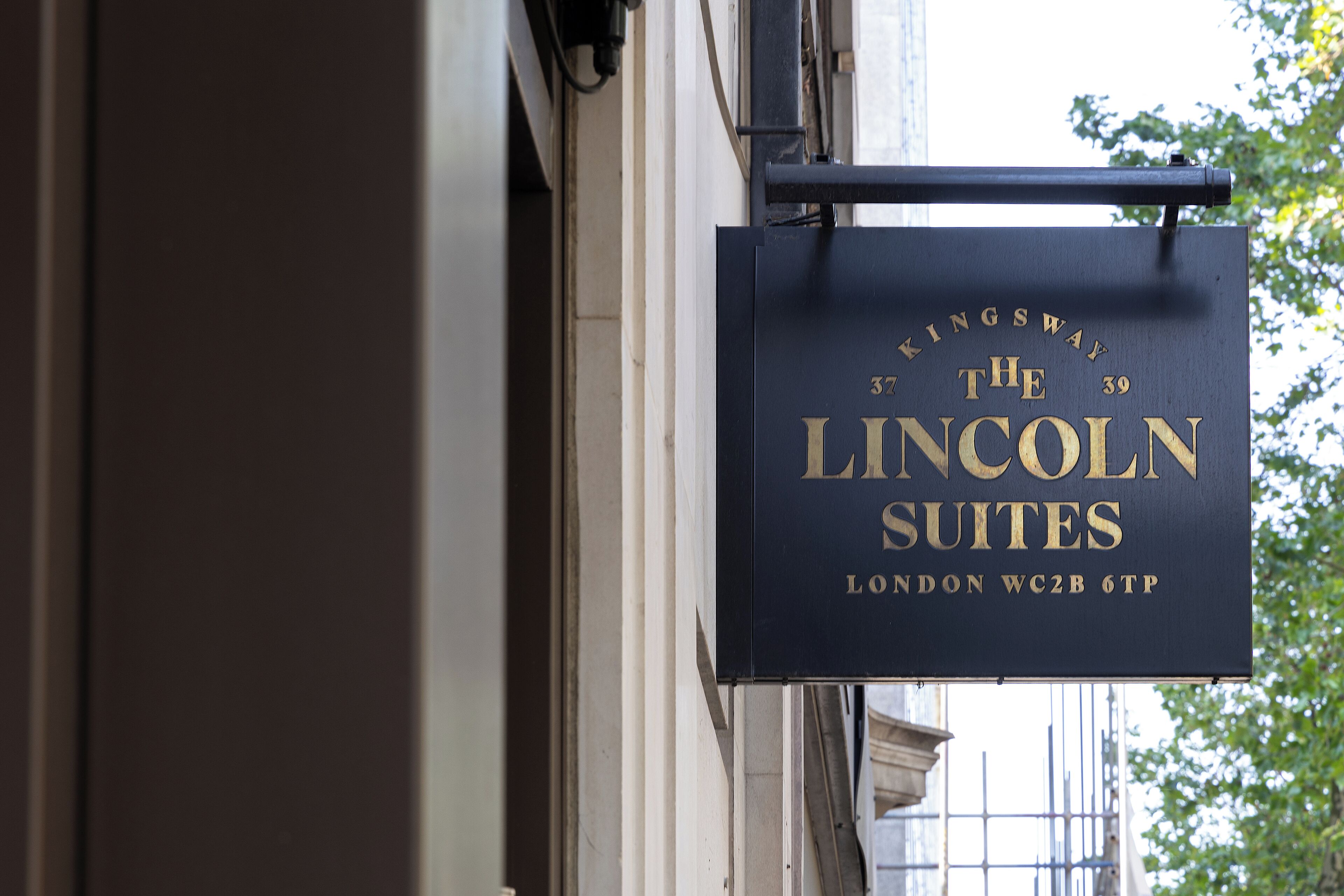 A sign for 'The Lincoln Suites' at 37 Kingsway, London WC2B 6TP.