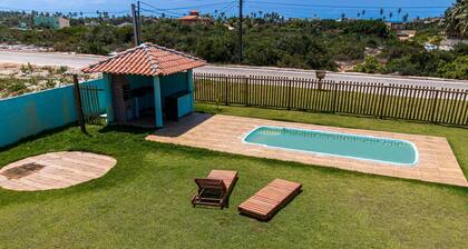 House with leisure facilities inside a gated community.