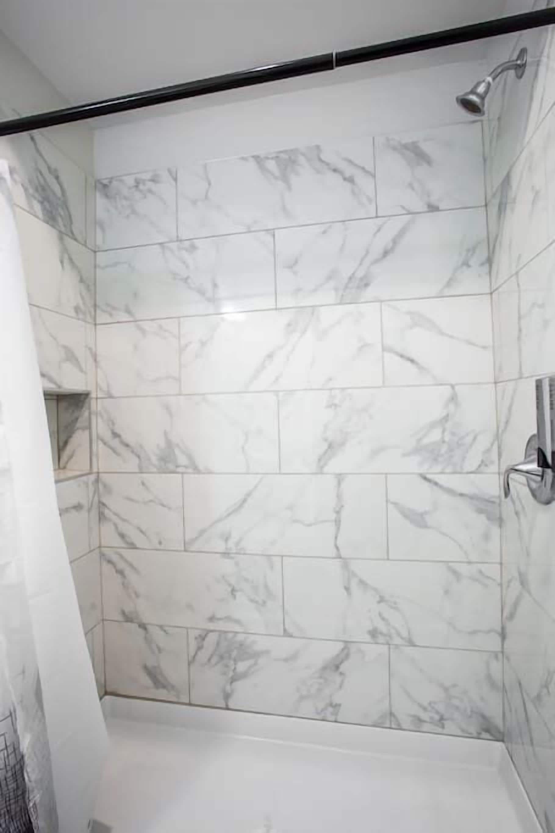 Shower, hair dryer, towels, shampoo