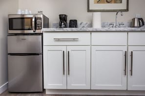 Microwave, coffee/tea maker, cookware/dishes/utensils