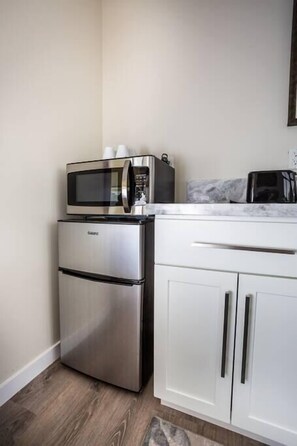 Microwave, coffee/tea maker, cookware/dishes/utensils