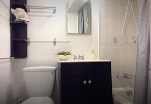 Combined shower/tub