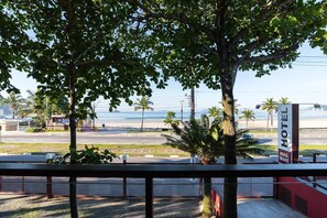 A hotel with a view of the beach and ocean.