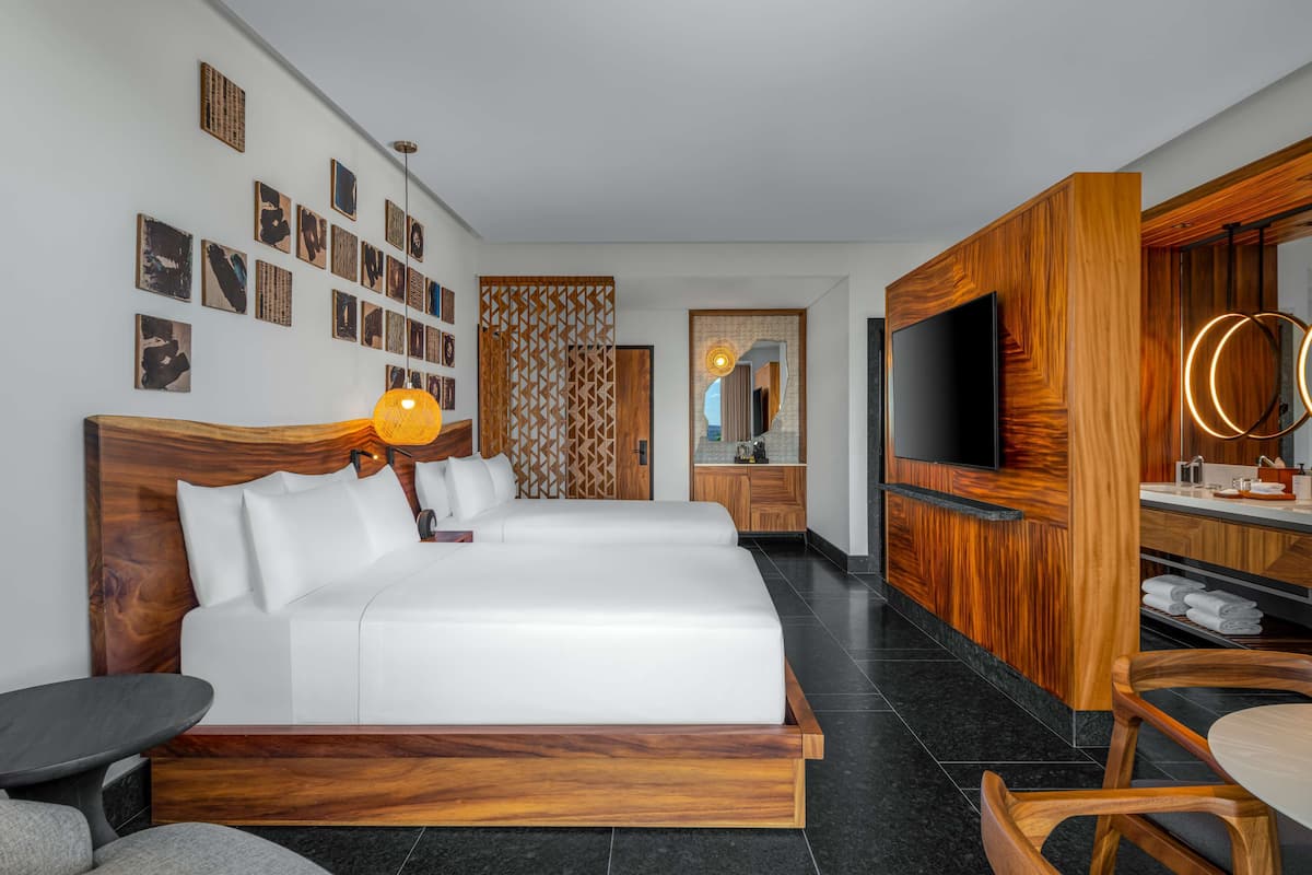 Premium bedding, pillow-top beds, minibar, in-room safe