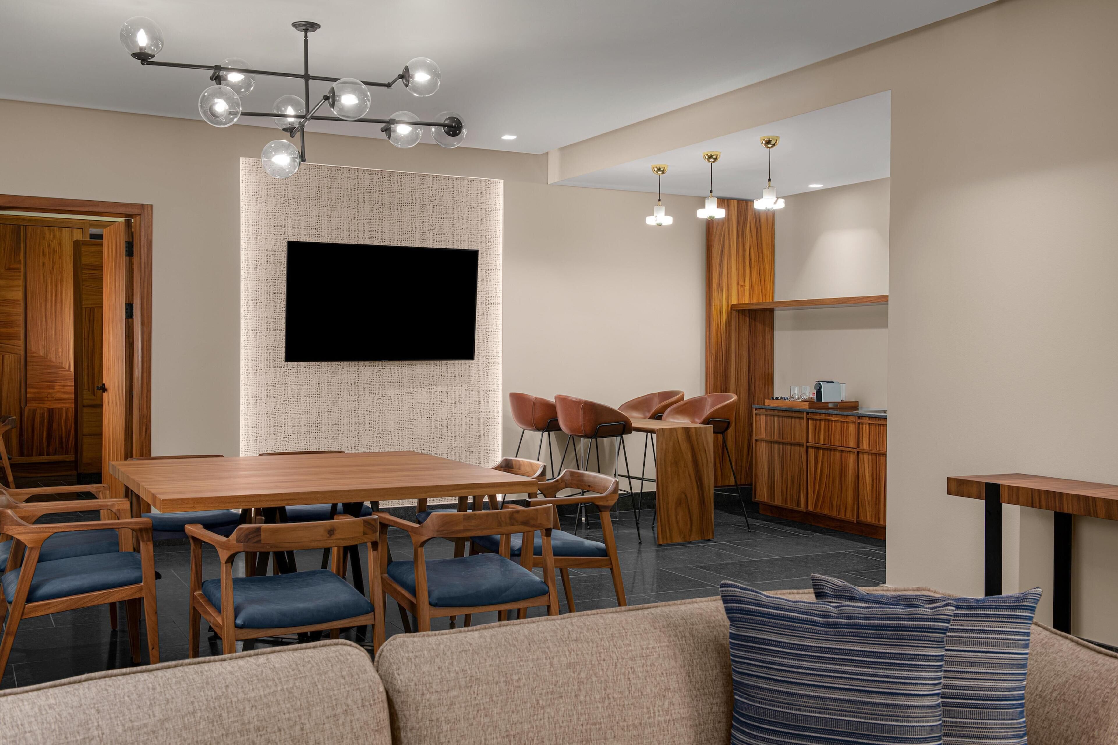 Suite, 1 Bedroom, Ocean View (Governors Suite) | Living area | 65-inch flat-screen TV with satellite channels, TV, pay films