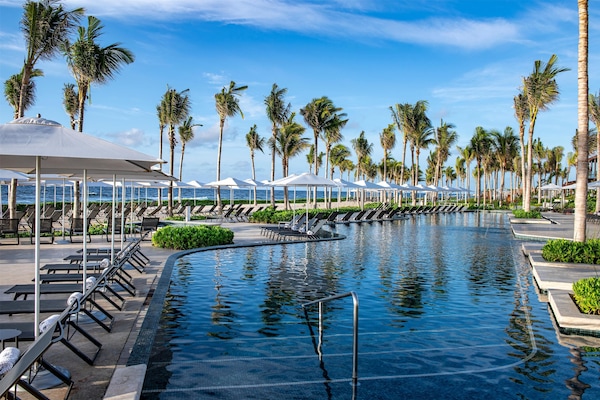 8 outdoor pools, cabanas (surcharge), pool umbrellas