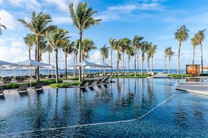 8 outdoor pools, cabanas (surcharge), pool umbrellas