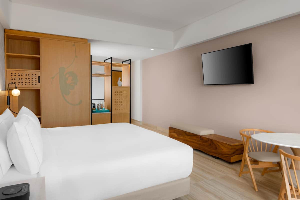 Premium bedding, free minibar, in-room safe, individually decorated