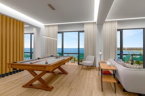 Presidential Suite, 1 King Bed | Living area | 65-inch Smart TV with digital channels, TV