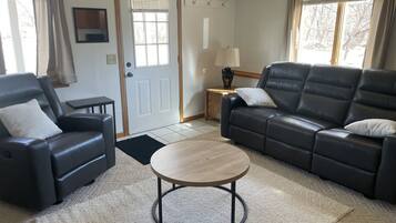 Smart TV, fireplace, DVD player, books