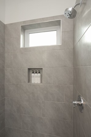 Shower, hair dryer, towels, soap