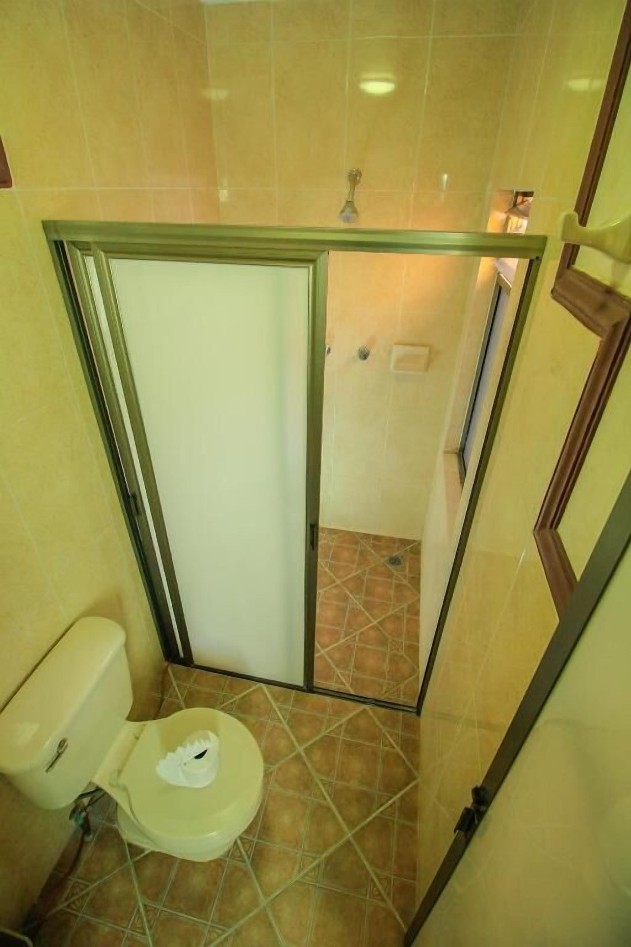 family quadruple room | bathroom | rainfall showerhead, designer toiletries, hair dryer, towels