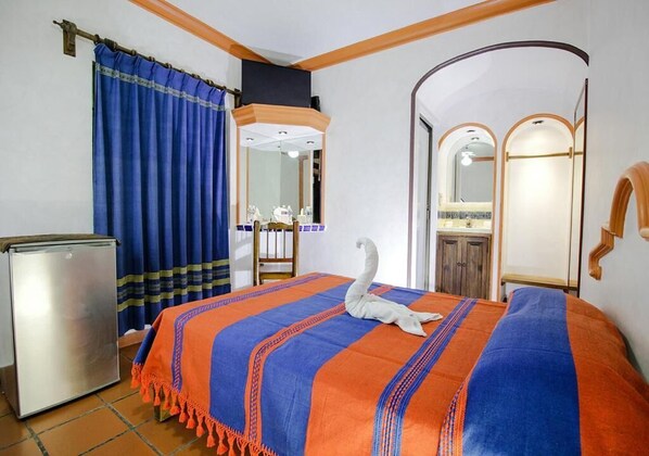 Premium bedding, down comforters, pillowtop beds, minibar