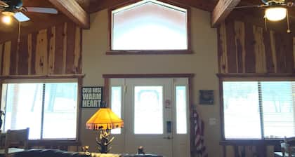 Just steps away from Rainbow Lake in this Dog Friendly Cabin