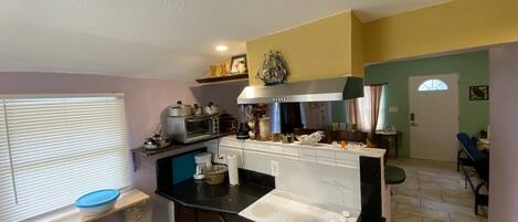 Fridge, microwave, stovetop, coffee/tea maker