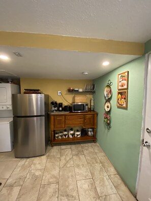 Fridge, microwave, stovetop, coffee/tea maker