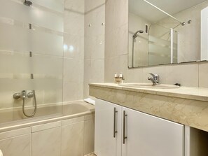 Shower, free toiletries, hair dryer, towels