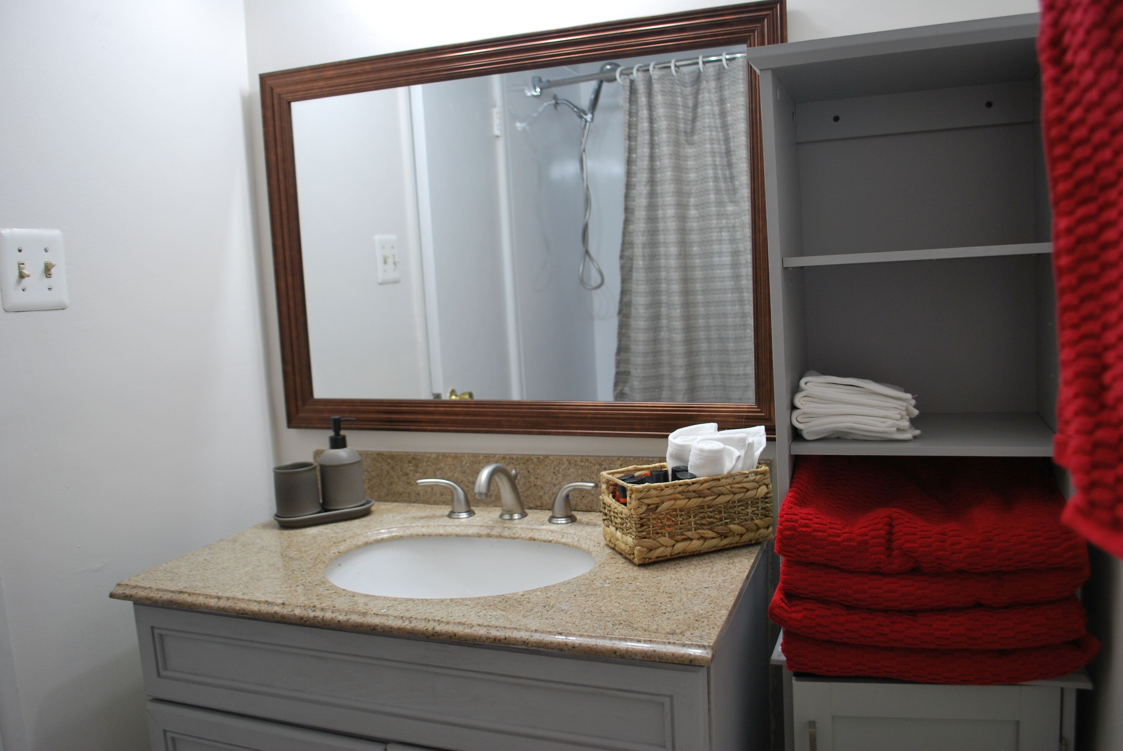 Bathtub, hair dryer, towels, soap