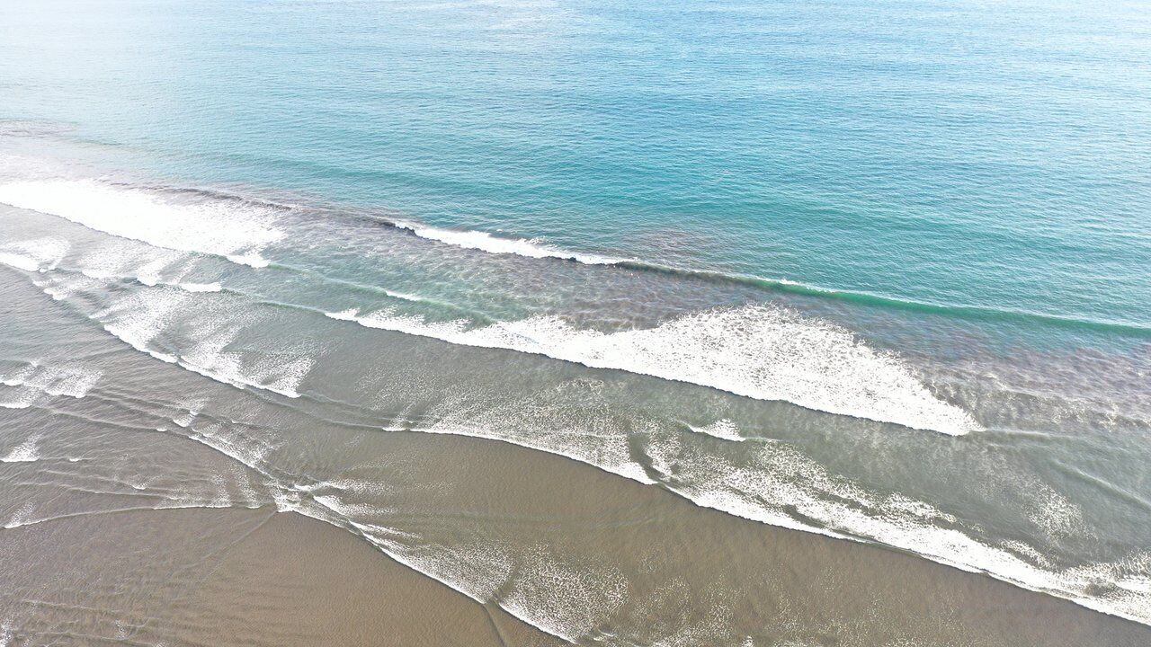 On the beach, sun loungers