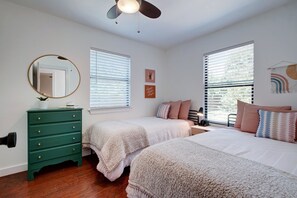 2 bedrooms, memory-foam beds, iron/ironing board, travel cot