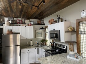 Fridge, microwave, oven, stovetop -  LEGACY CREEKS RANCH CABINS (Whitefish)