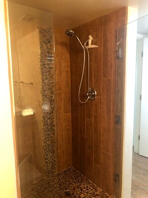 Combined shower/tub, hair dryer, towels, toilet paper