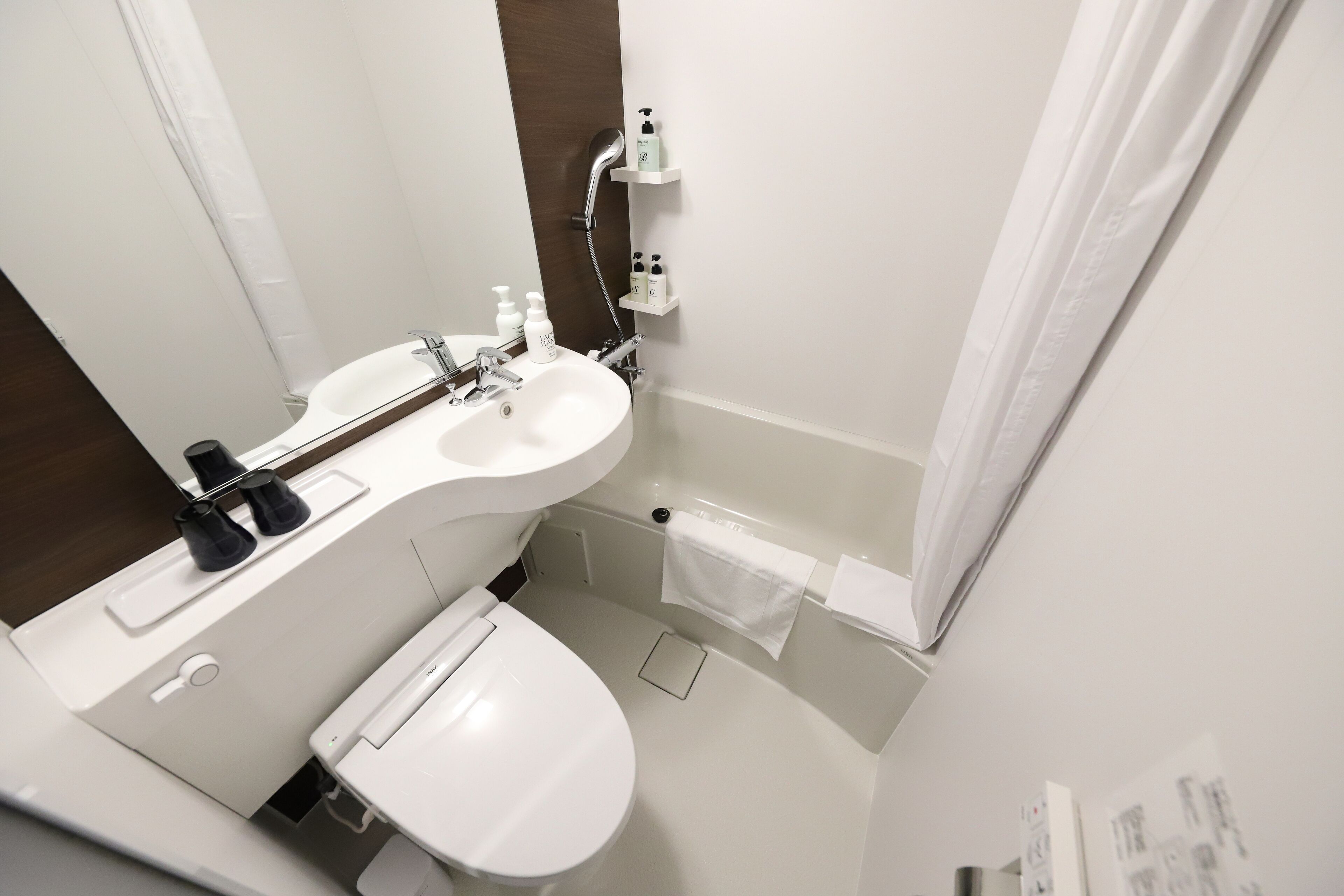 combined shower/bathtub, free toiletries, hair dryer, bathrobes