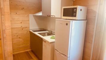 Fridge, microwave, stovetop, cookware/dishes/utensils