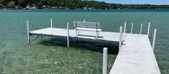 Torch Lake Oasis: Serene Views & Waterfront Bliss Await!