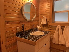 Combined shower/tub, hair dryer, towels, soap