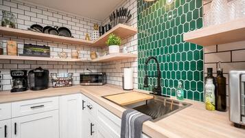 Fridge, microwave, coffee/tea maker, toaster
