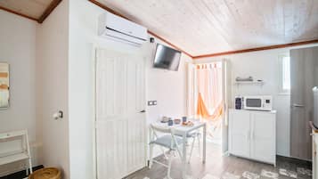 Apartamento, 1 quarto | Cozinha privada | Frigobar, micro-ondas, máquina de café expresso