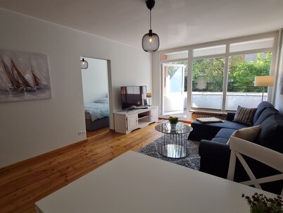 Modern city apartment with balcony and private parking space in a quiet location