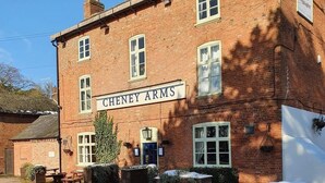 A brick building with a sign reading "CHENEY ARMS". - The Cheney Arms (Leicester)
