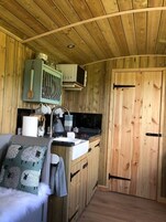 Cabin | Private kitchen | Fridge, microwave, stovetop, electric kettle
