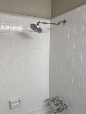 Combined shower/tub, hair dryer, towels, soap