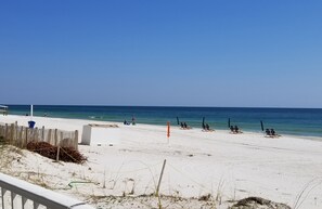 On the beach, sun loungers