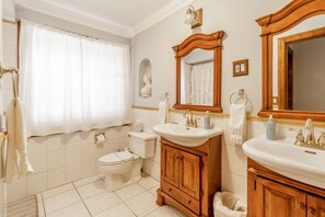 Combined shower/tub, jetted tub