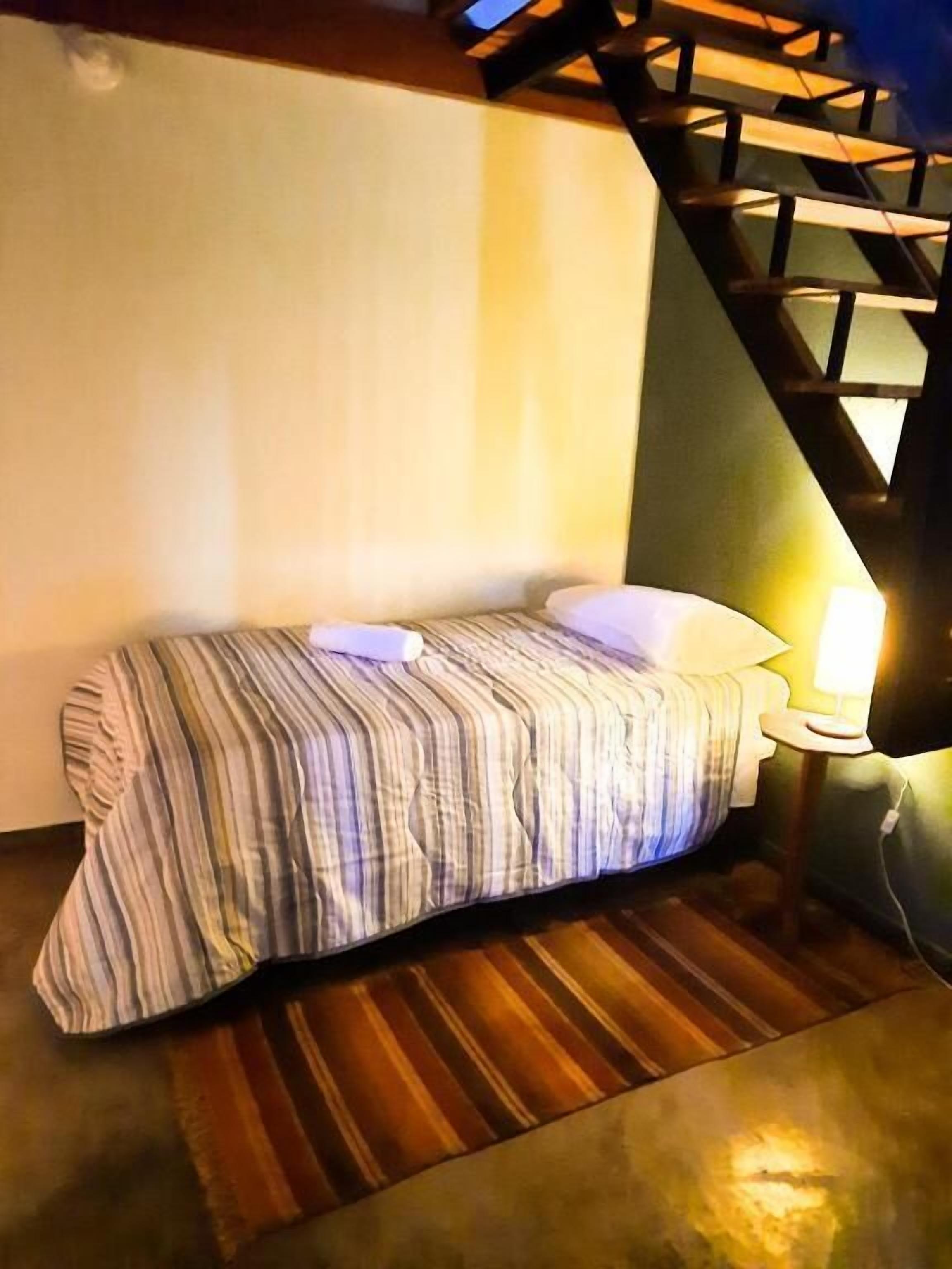 Family Room | Minibar, blackout drapes, WiFi (free), bed sheets