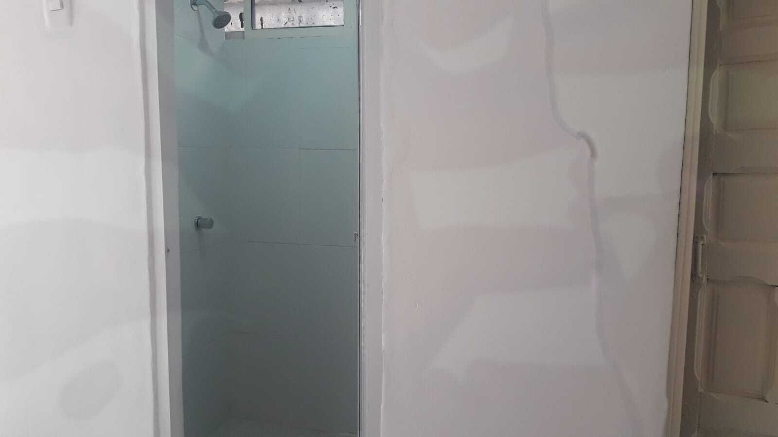 Shower, towels, soap, toilet paper